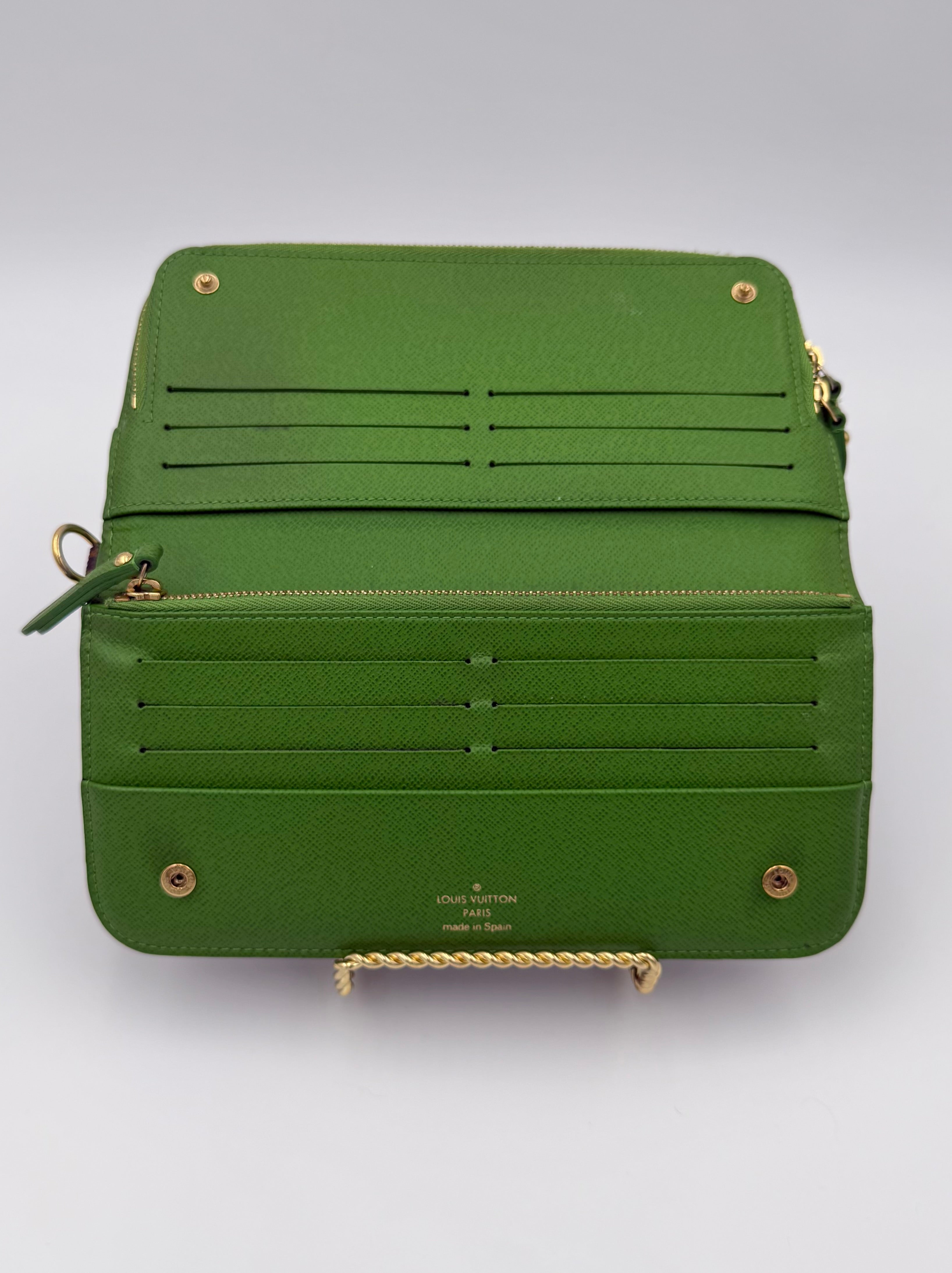 Louis Vuitton Insolite Wallet with bright green interior and gold hardware