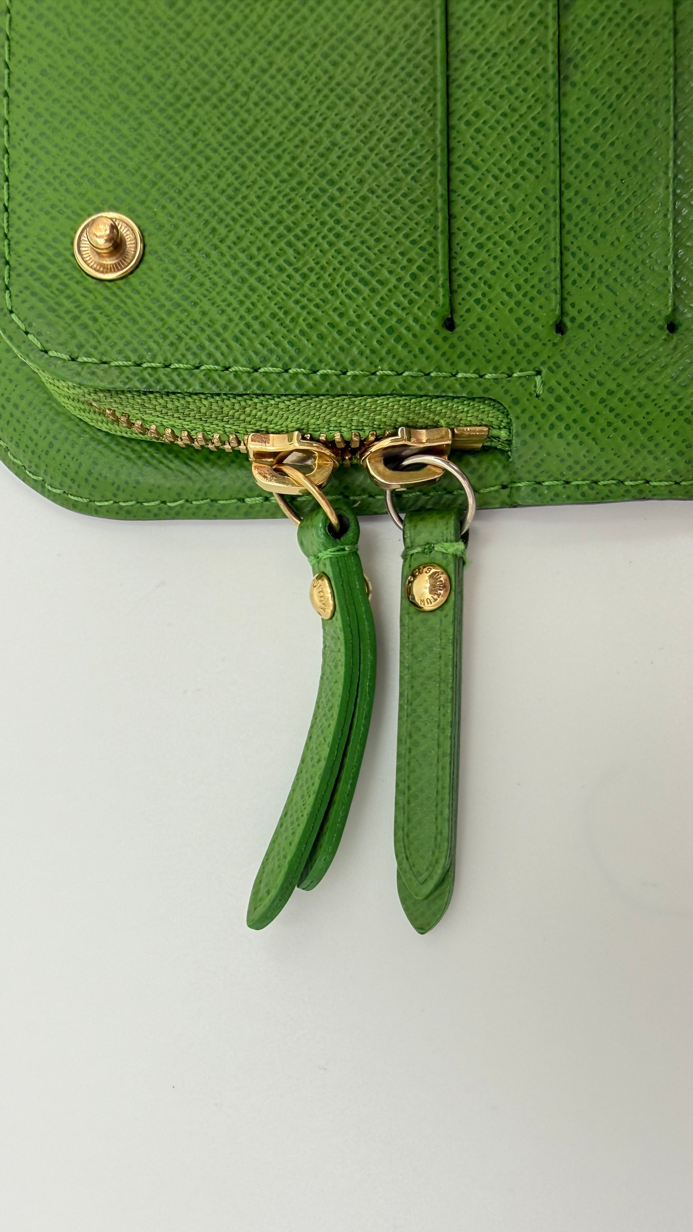 Louis Vuitton Insolite Wallet with bright green interior and gold hardware