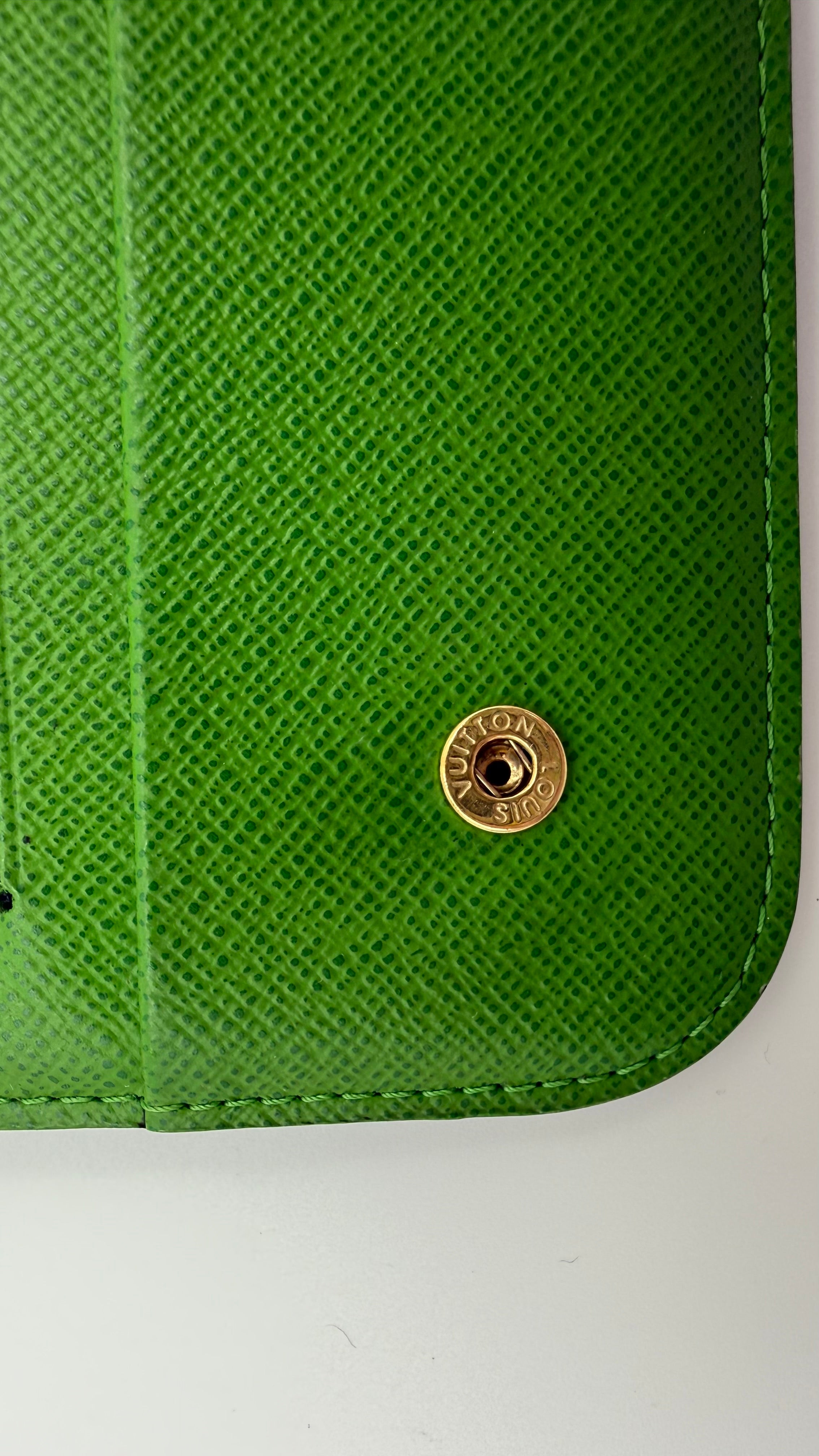 Louis Vuitton Insolite Wallet with bright green interior and gold hardware