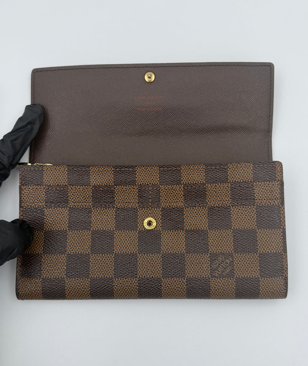 Louis Vuitton Damier Ebene wallet interior, brown leather, snap closure