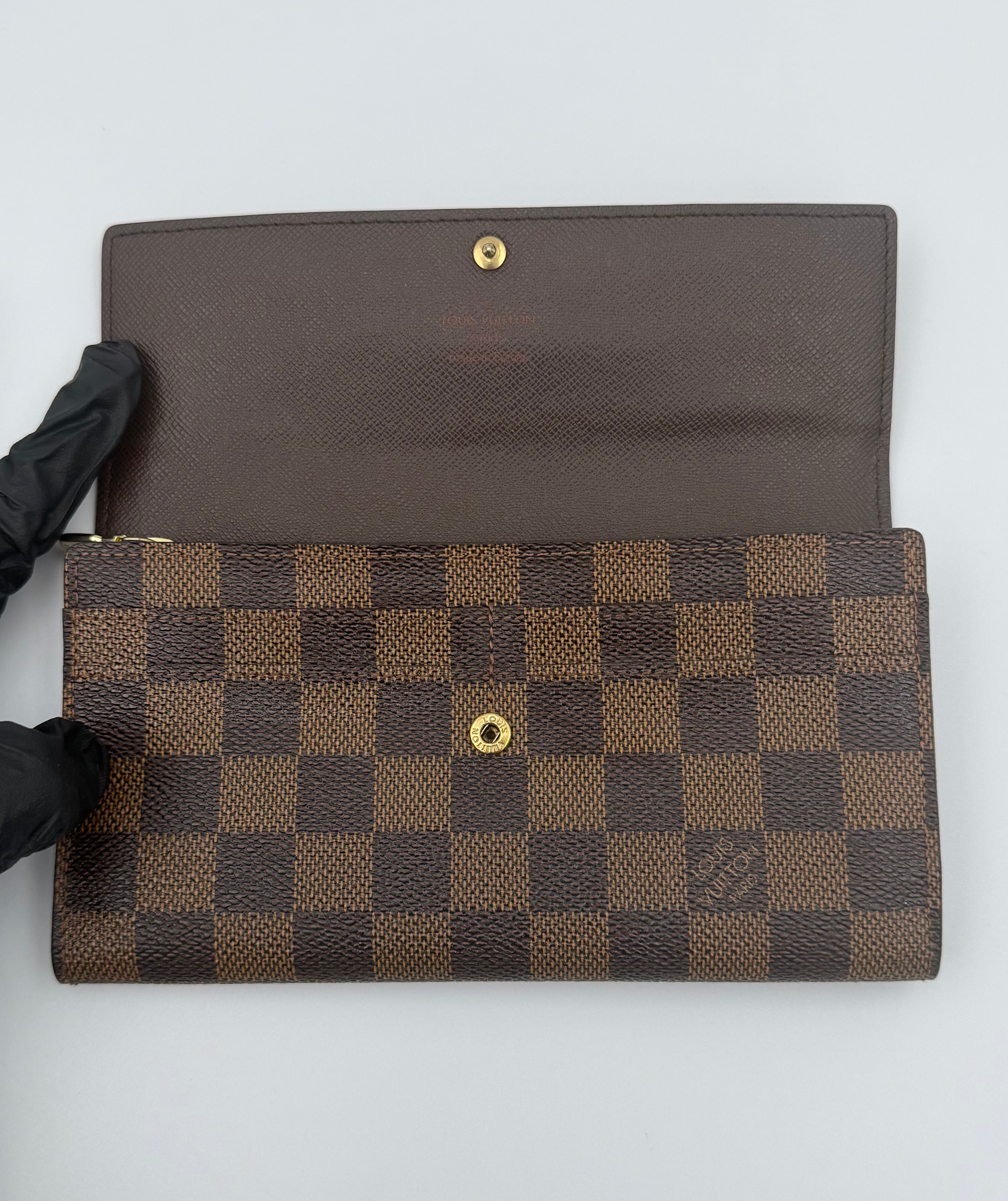 Louis Vuitton Damier Ebene wallet interior, brown leather, snap closure