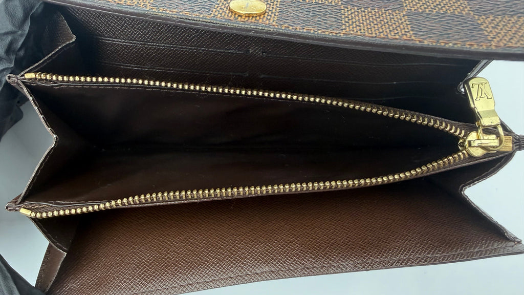 Louis Vuitton zipper compartment interior showing clean lining and functional zipper