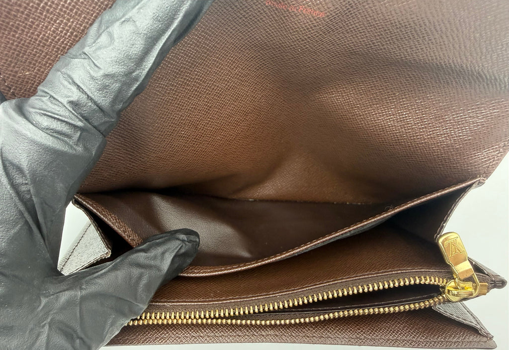 Louis Vuitton wallet interior compartment, clean brown leather lining